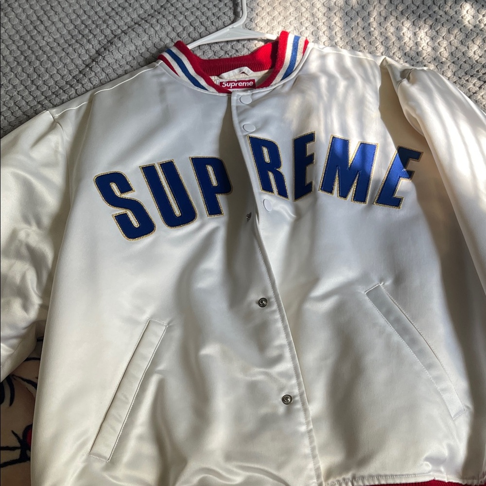 Supreme White Jacket with Blue and Red Accents